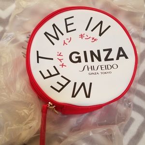 Red shiseido ginza round cosmetic bag